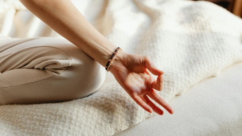 Close Up of Hand of Woman in Yoga Pose